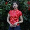 เสื้อตรุษจีนผู้หญิง (เสื้อกี่เพ้า) แขนสั้น สีแดง ลายดอกเหมยคู่กับซังฮี้