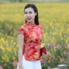 เสื้อตรุษจีนผู้หญิง (เสื้อกี่เพ้า) แขนสั้น สีแดง ลายดอกไม่มงคลจีน