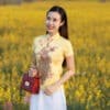 เสื้อตรุษจีนผู้หญิง (เสื้อกี่เพ้า) แขนสั้น สีเหลือง ลายนกยูง